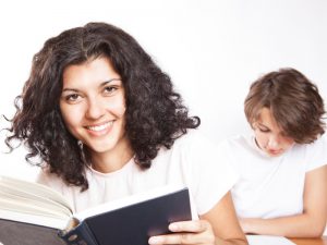 smiling with book